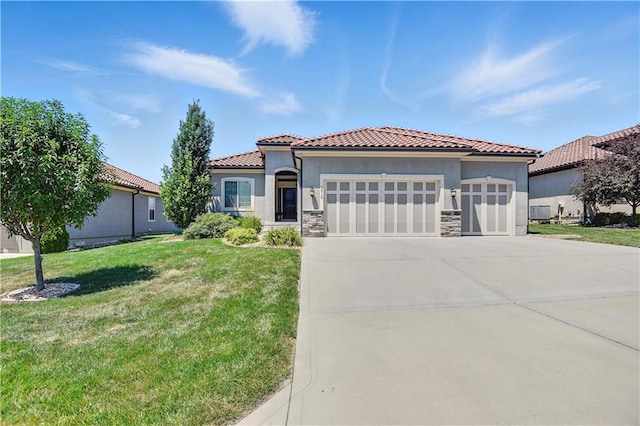 3912 SW Odell Dr, Lees Summit, MO 64082 - mediterranean / spanish-style house with a garage, driveway, stone siding, a front lawn, and stucco siding