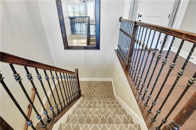 3912 SW Odell Dr, Lees Summit, MO 64082 - staircase with baseboards and carpet floors