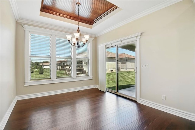 3912 SW Odell Dr, Lees Summit, MO 64082 - unfurnished dining area with a raised ceiling, a chandelier, dark wood-style floors, and ornamental molding
