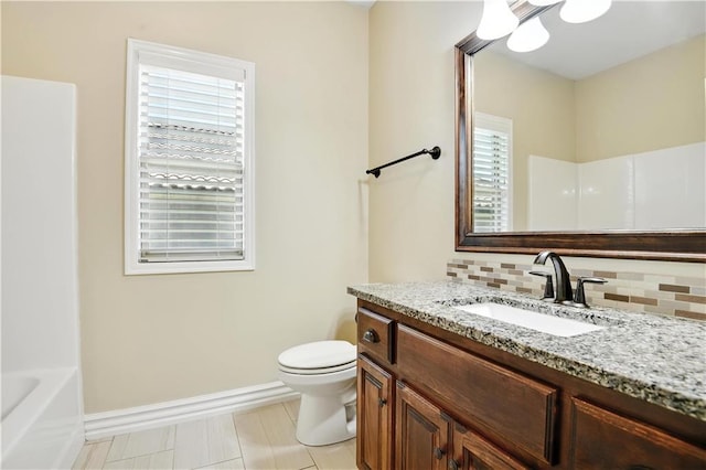 3912 SW Odell Dr, Lees Summit, MO 64082 - full bathroom featuring vanity and tasteful backsplash