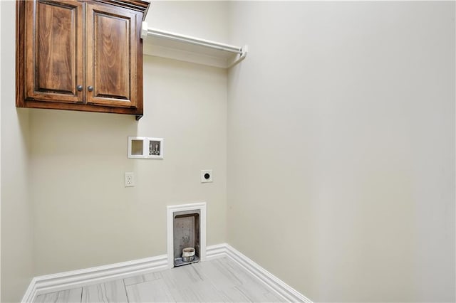 3912 SW Odell Dr, Lees Summit, MO 64082 - laundry area with hookup for an electric dryer, washer hookup, and cabinet space