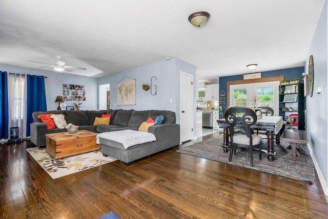 3006 S 39th St, Kansas City, KS 66106 - living room with wood finished floors and a ceiling fan