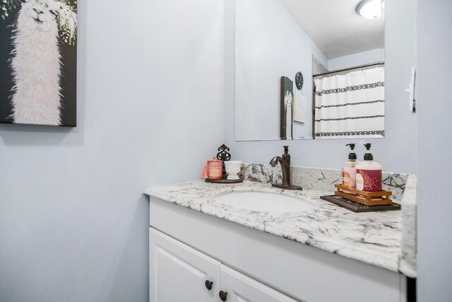 3006 S 39th St, Kansas City, KS 66106 - bathroom featuring vanity