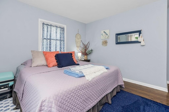 3006 S 39th St, Kansas City, KS 66106 - bedroom with wood finished floors and baseboards