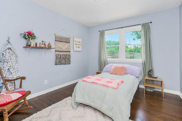 3006 S 39th St, Kansas City, KS 66106 - bedroom with baseboards and wood finished floors