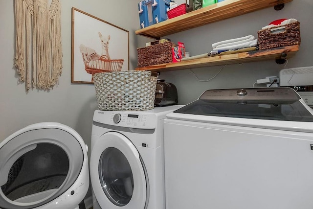 3006 S 39th St, Kansas City, KS 66106 - washroom with independent washer and dryer