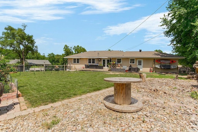 3006 S 39th St, Kansas City, KS 66106 - back of property with a fenced backyard, french doors, and a patio