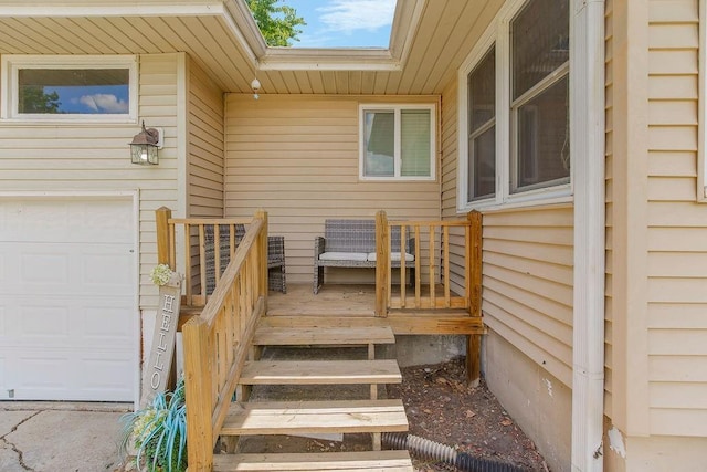 3006 S 39th St, Kansas City, KS 66106 - view of exterior entry with an attached garage