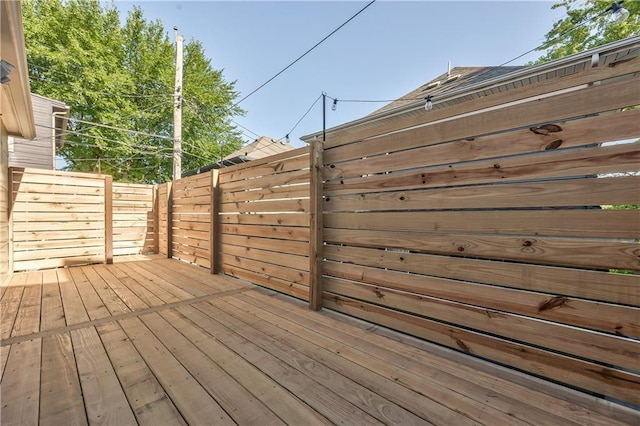 2606 Smart Ave, Kansas City, MO 64124 - view of wooden deck