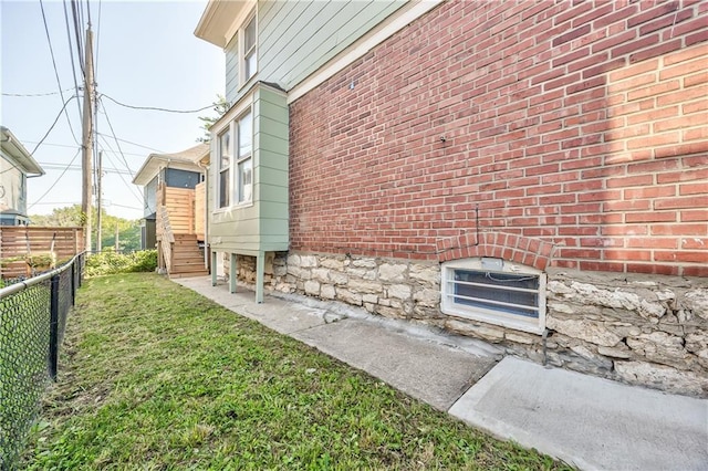 2606 Smart Ave, Kansas City, MO 64124 - view of side of home featuring brick siding