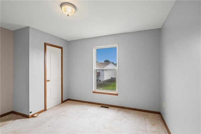 913 N Cochise Ave, Independence, MO 64056 - spare room with light carpet