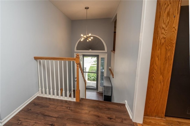 207 Woodhaven Dr, Smithville, MO 64089 - foyer with a chandelier and wood finished floors