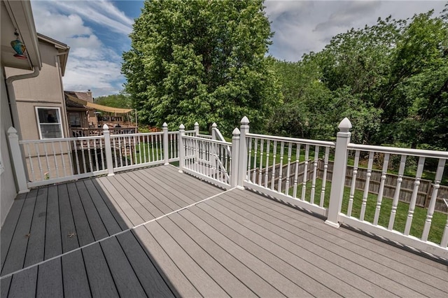 207 Woodhaven Dr, Smithville, MO 64089 - wooden terrace featuring a yard