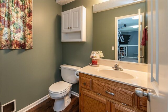 207 Woodhaven Dr, Smithville, MO 64089 - bathroom with vanity and wood finished floors