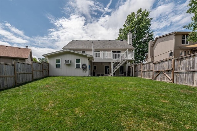 207 Woodhaven Dr, Smithville, MO 64089 - back of house featuring stairway, a fenced backyard, a chimney, and a wooden deck
