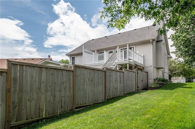 207 Woodhaven Dr, Smithville, MO 64089 - rear view of property with stairway and a shingled roof