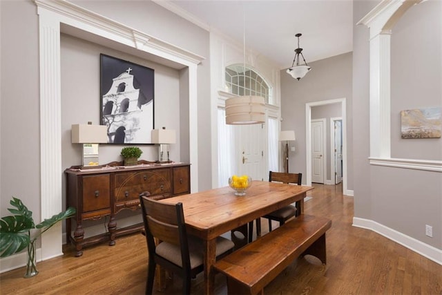 14333 Norwood St, Leawood, KS 66224 - dining space with wood finished floors and decorative columns