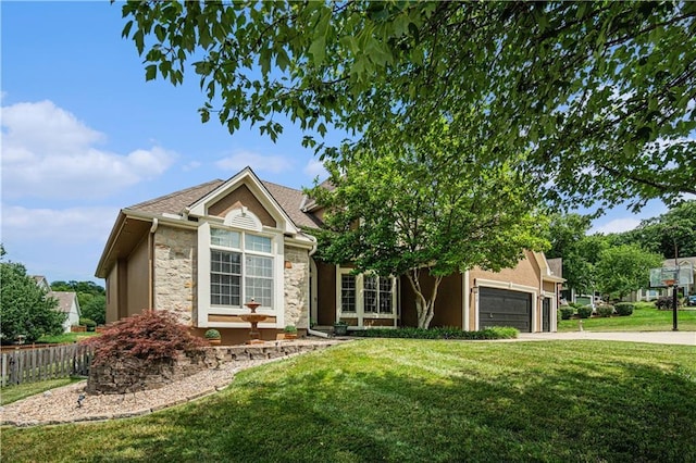 5713 NE Sapphire Ct, Lees Summit, MO 64064 - single story home with stone siding, an attached garage, concrete driveway, and stucco siding
