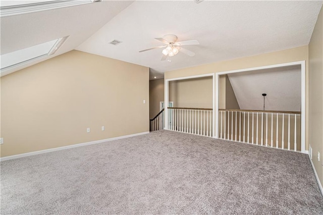 5713 NE Sapphire Ct, Lees Summit, MO 64064 - bonus room featuring ceiling fan, carpet flooring, and vaulted ceiling