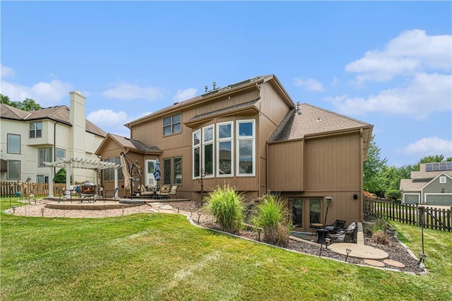 5713 NE Sapphire Ct, Lees Summit, MO 64064 - back of house with a patio, a pergola, and a fenced backyard