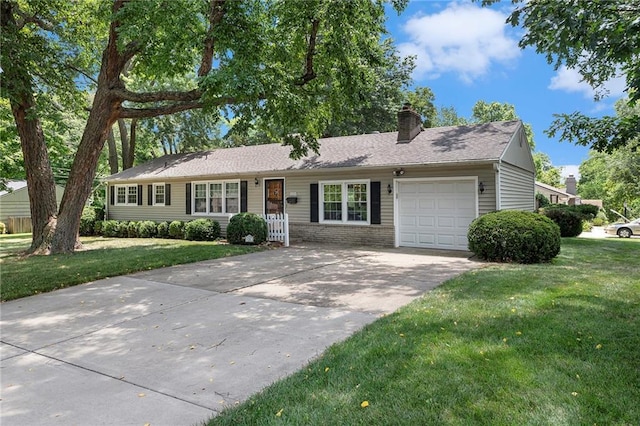 8201 W 89th St, Overland Park, KS 66212 - ranch-style house with a chimney, an attached garage, concrete driveway, and a front lawn