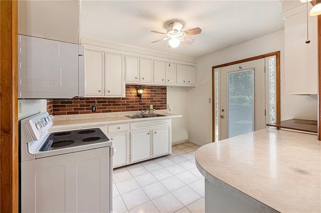 8201 W 89th St, Overland Park, KS 66212 - kitchen featuring white electric range, white cabinets, ceiling fan, and light countertops