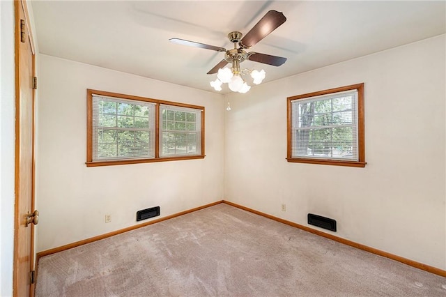 8201 W 89th St, Overland Park, KS 66212 - carpeted spare room with healthy amount of natural light and a ceiling fan