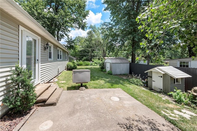 8201 W 89th St, Overland Park, KS 66212 - view of yard with a storage shed, a patio area, and view of scattered trees