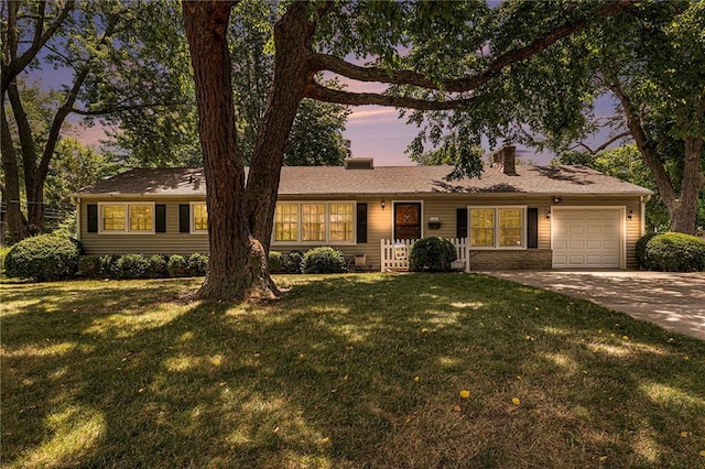 8201 W 89th St, Overland Park, KS 66212 - single story home with a garage, driveway, a chimney, and a front yard