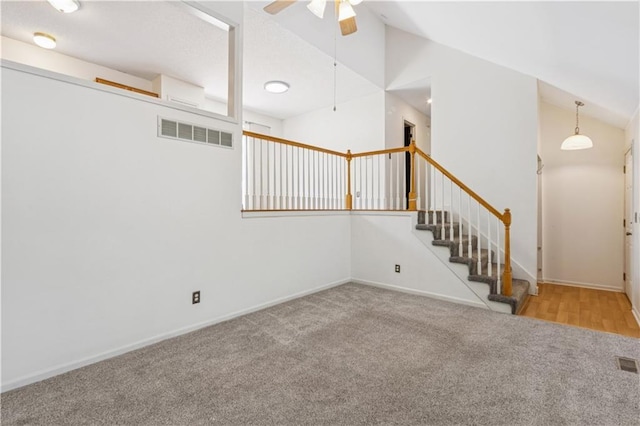 17150 S Walter St, Gardner, KS 66030 - spare room with ceiling fan, carpet floors, vaulted ceiling, and stairway