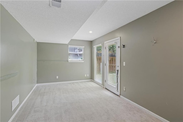 17150 S Walter St, Gardner, KS 66030 - carpeted spare room with a textured ceiling and baseboards