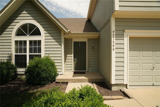 17586 W 161st St, Olathe, KS 66062 - entrance to property with an attached garage