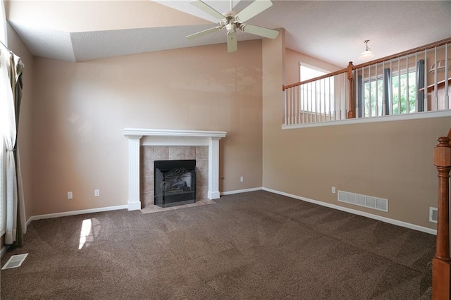 17586 W 161st St, Olathe, KS 66062 - unfurnished living room featuring a ceiling fan, carpet floors, vaulted ceiling, and a fireplace