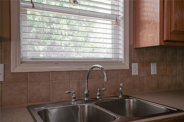 17586 W 161st St, Olathe, KS 66062 - kitchen view of backsplash and brown cabinetry