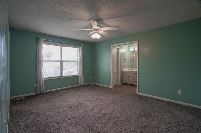 17586 W 161st St, Olathe, KS 66062 - unfurnished bedroom featuring carpet, a textured ceiling, ensuite bath, and a ceiling fan