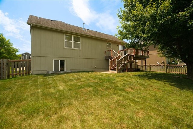 17586 W 161st St, Olathe, KS 66062 - back of property featuring stairs, a fenced backyard, and a deck