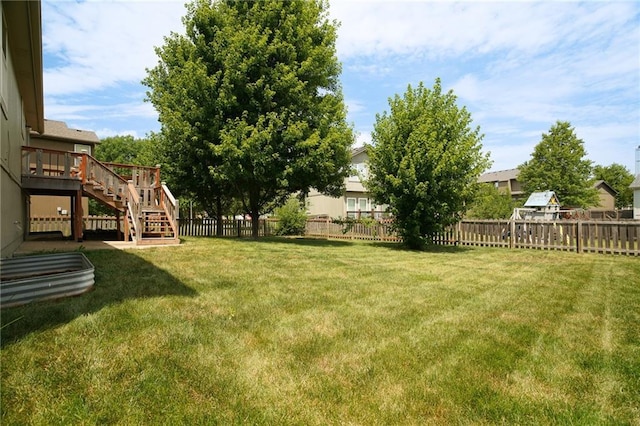 17586 W 161st St, Olathe, KS 66062 - fenced backyard featuring stairs and a wooden deck