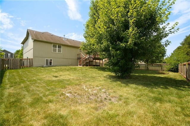 17586 W 161st St, Olathe, KS 66062 - fenced backyard with stairs and a wooden deck