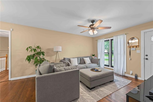 8751 Goddard St, Overland Park, KS 66214 - living room with ceiling fan and wood finished floors