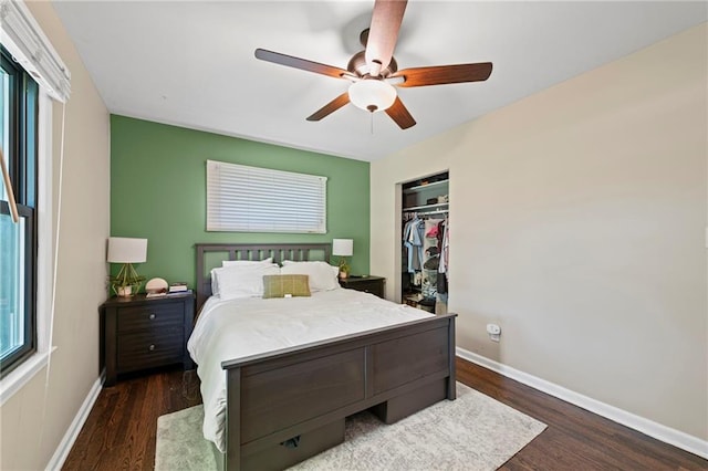 8751 Goddard St, Overland Park, KS 66214 - bedroom with dark wood finished floors, a closet, and ceiling fan