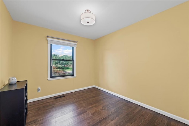 8751 Goddard St, Overland Park, KS 66214 - unfurnished room with wood finished floors and baseboards