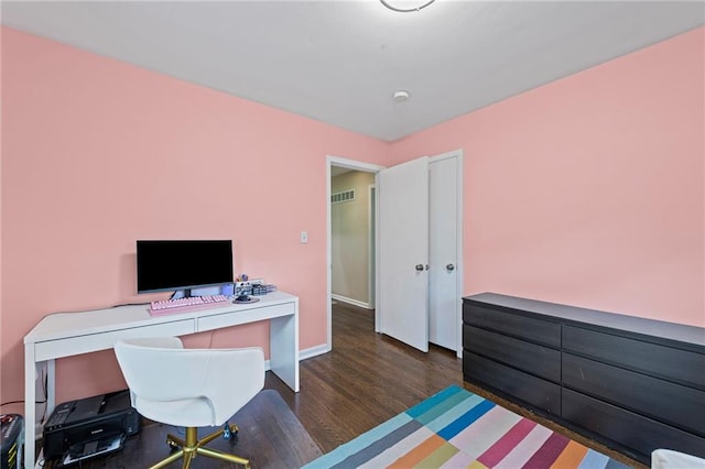 8751 Goddard St, Overland Park, KS 66214 - home office with wood finished floors and baseboards