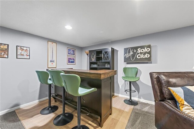 8751 Goddard St, Overland Park, KS 66214 - indoor dry bar with wood finished floors and recessed lighting