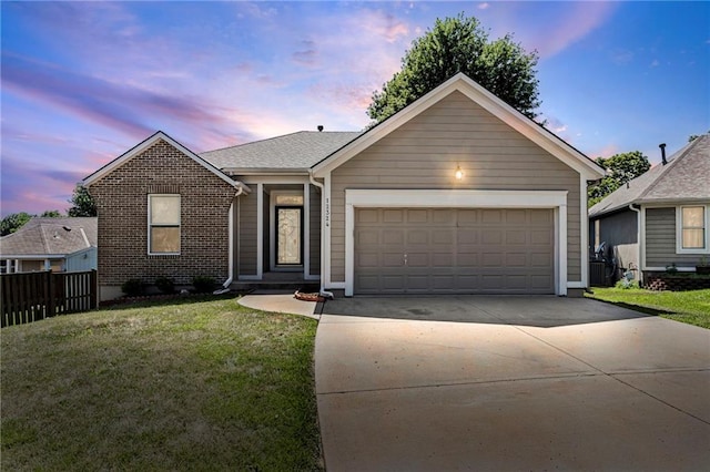 12324 S Clinton St, Olathe, KS 66061 - ranch-style house featuring concrete driveway, an attached garage, and brick siding