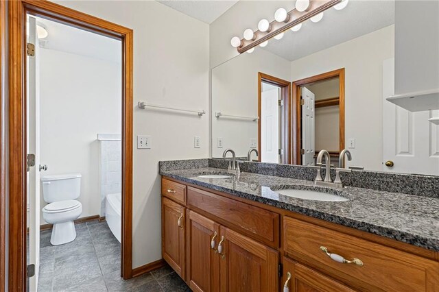12324 S Clinton St, Olathe, KS 66061 - full bath with double vanity and tile patterned flooring