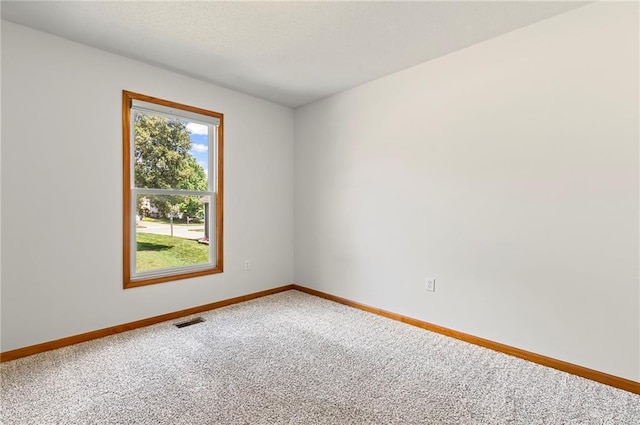 12324 S Clinton St, Olathe, KS 66061 - empty room with carpet flooring and baseboards