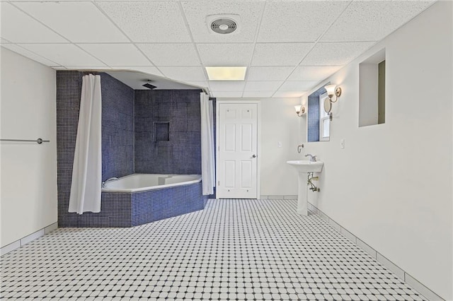 12324 S Clinton St, Olathe, KS 66061 - full bathroom featuring tiled shower / bath combo and a paneled ceiling