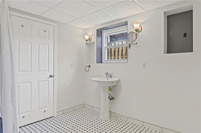 12324 S Clinton St, Olathe, KS 66061 - bathroom featuring electric panel and a drop ceiling