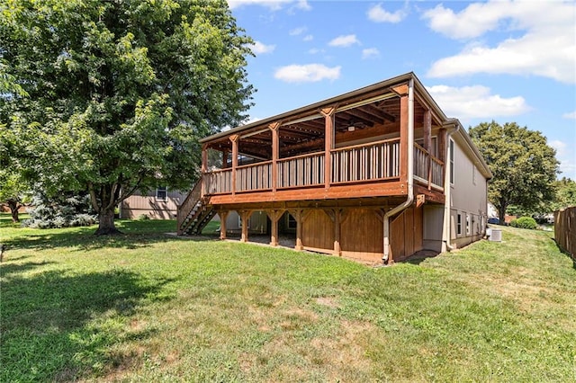 12324 S Clinton St, Olathe, KS 66061 - rear view of property featuring a yard, stairs, and a deck