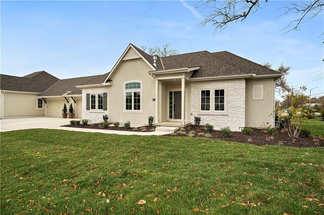 7239 Allman Dr, Shawnee, KS 66217 - ranch-style home featuring a front yard, stone siding, and driveway